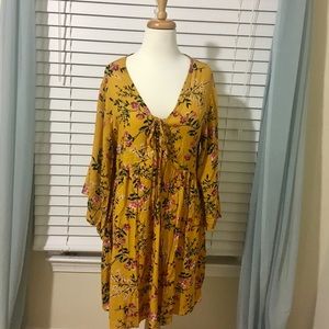 Lace up plunge neck kimono sleeve dress.